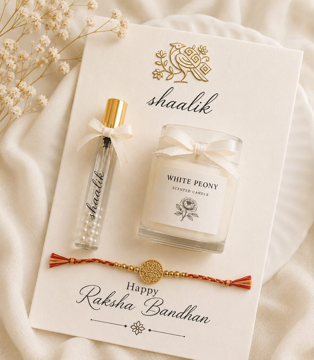 Rakhi Hamper-Perfume, a scented candle and keepsake rakhi.